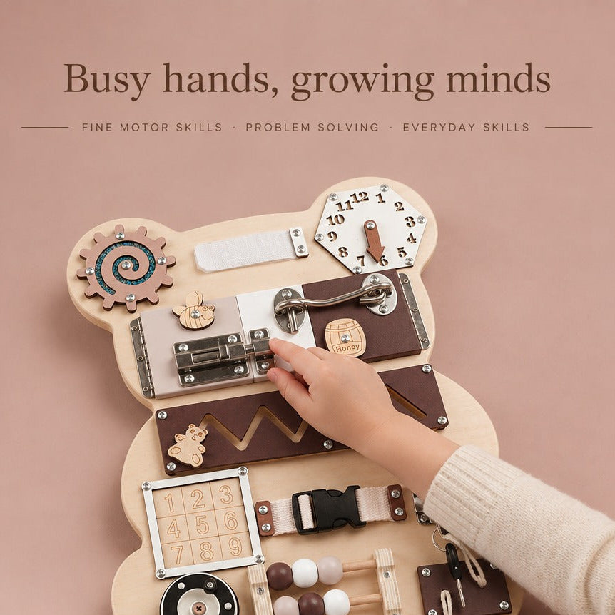 Child hands sliding the bolt on the bear busy board: fine motor skills, problem solving, everyday skills