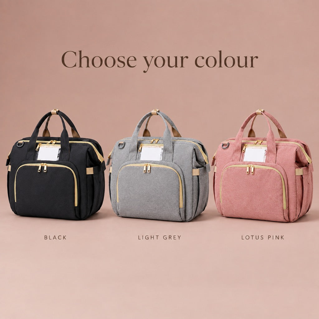 Changing bag in three colours: black, light grey and lotus pink