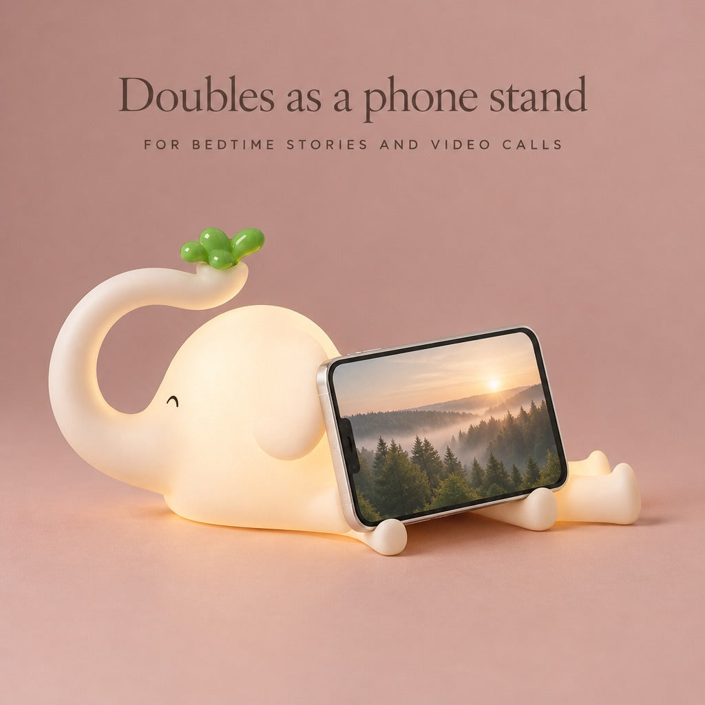 Smartphone resting against the elephant night light as a phone stand