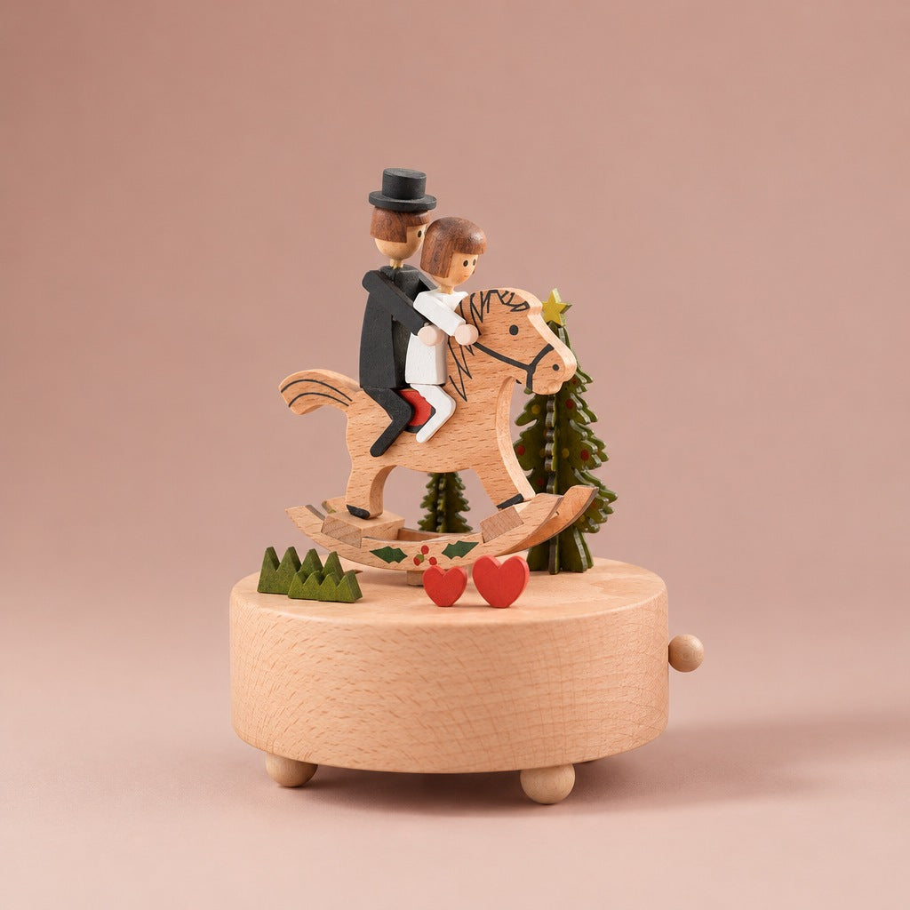 Wooden music box with a couple riding a rocking horse