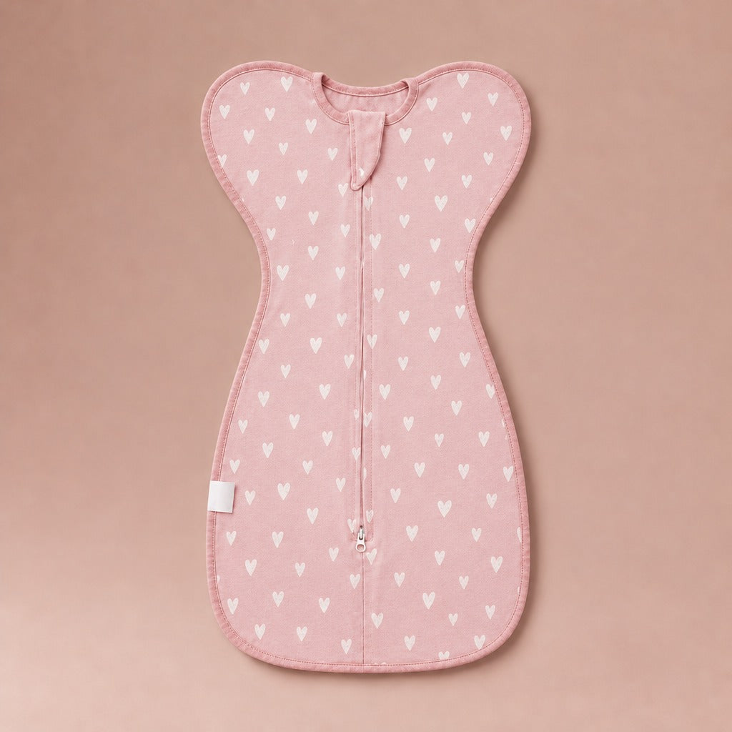 The Petal Swaddle in Peach Pink Hearts