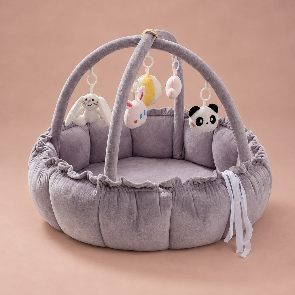 Baby play gym nest in purple velvet with play arch and hanging plush animal toys
