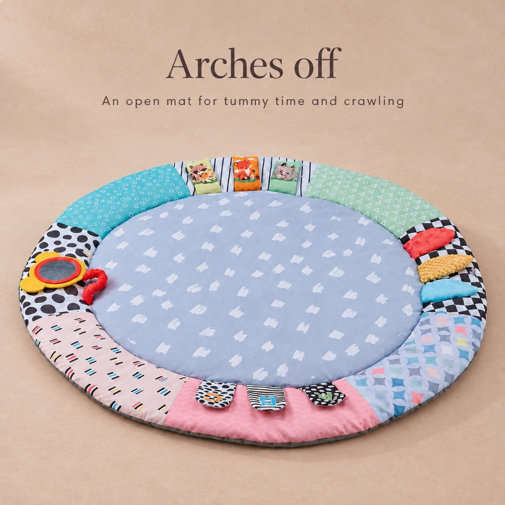 Play mat with the arches removed, an open mat for tummy time and crawling