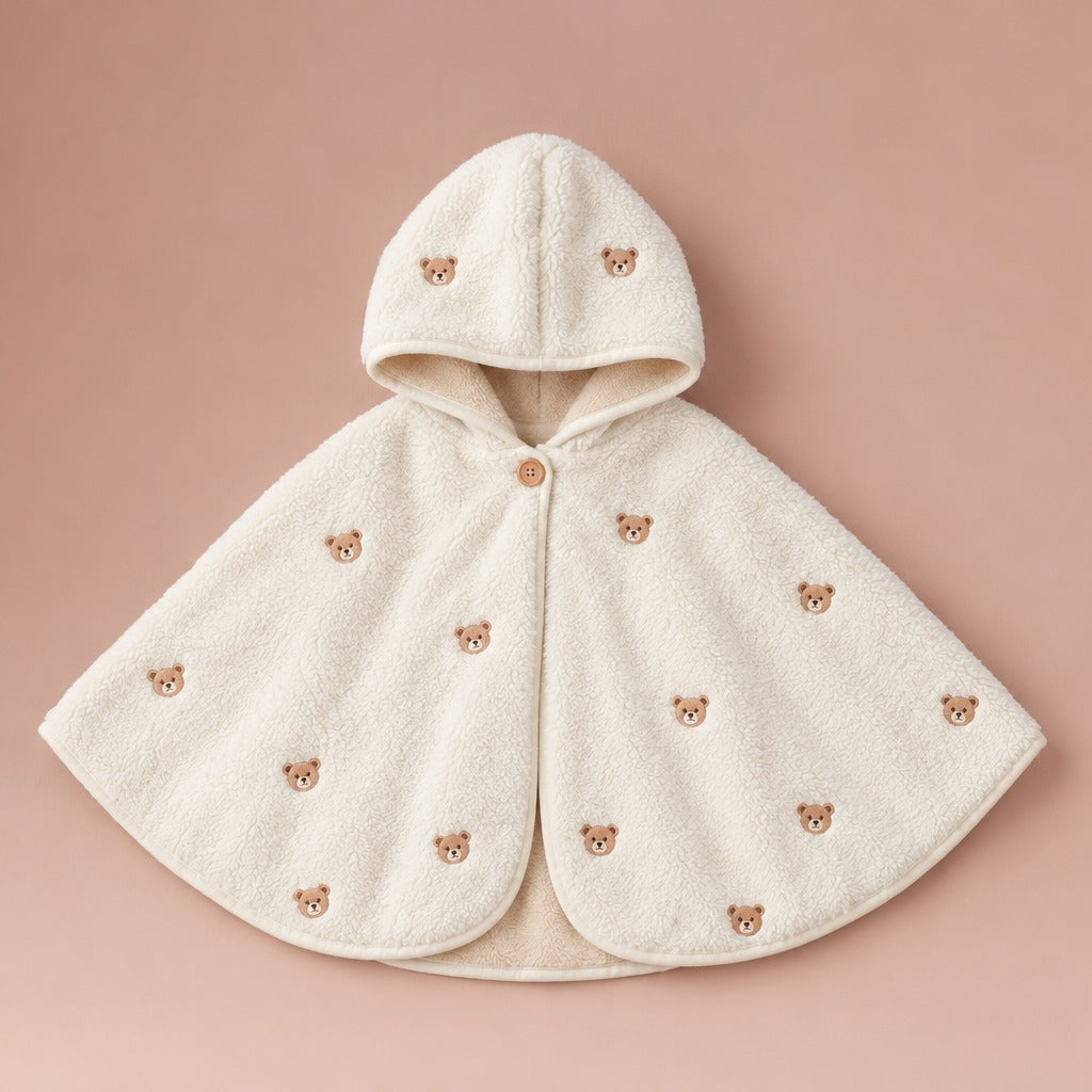 The Teddy Mantle hooded ivory fleece toddler cape with embroidered bears