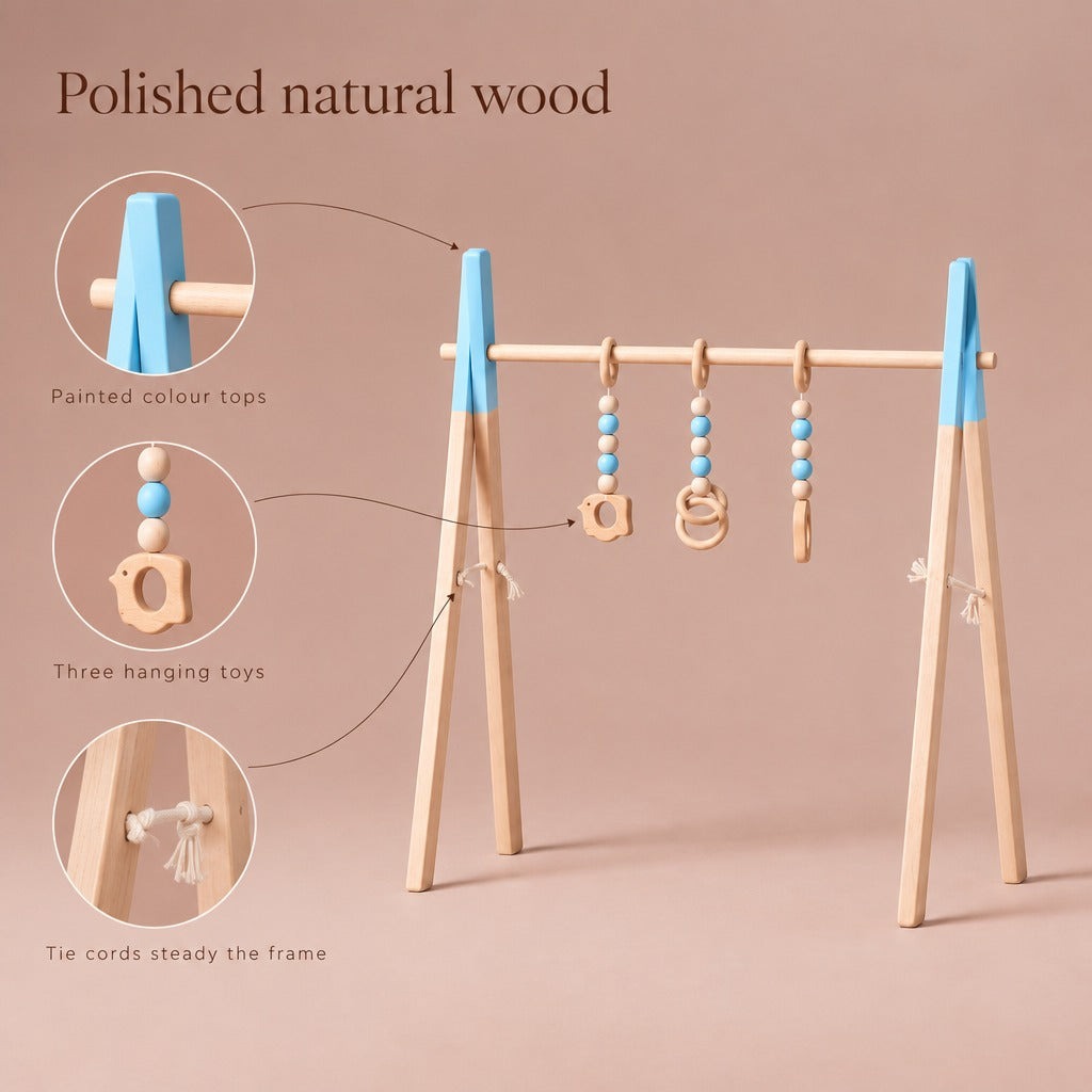 Wooden baby play gym details: painted colour tops, three hanging toys, tie cords