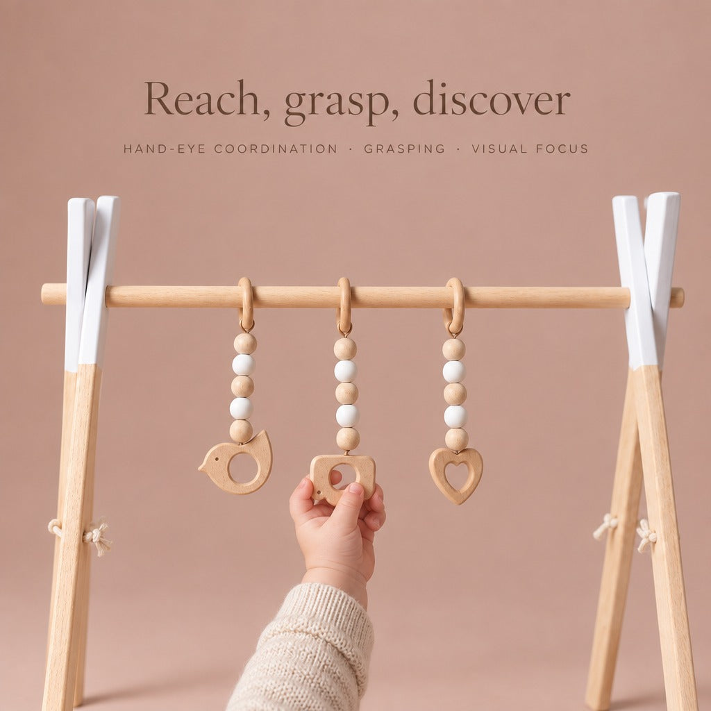 Baby hand grasping a wooden toy on the play gym: hand-eye coordination, grasping, visual focus